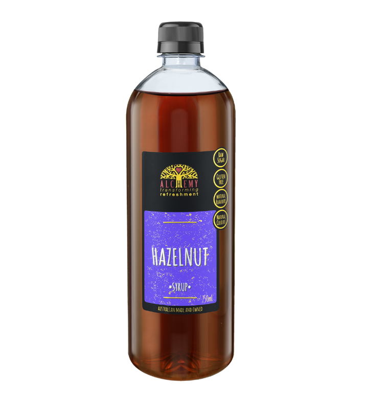 Front of bottle alchemy premium hazelnut syrup