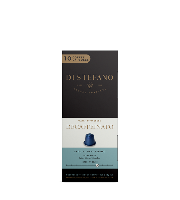 A tall rectangular box of Di Stefano Decaffeinato coffee capsules