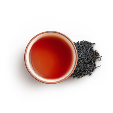 Cup of english breakfast tea with leaves