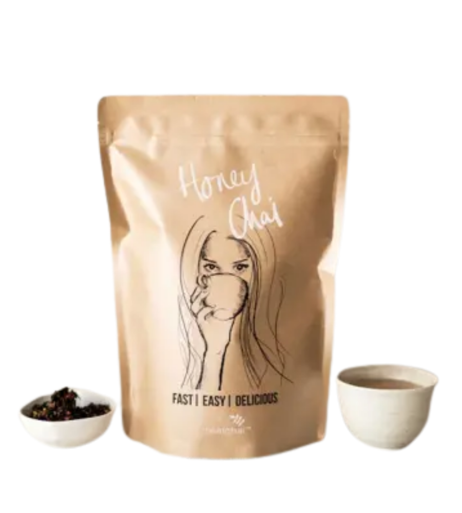 Image of real honey chai spice blend with cup of chai latte 